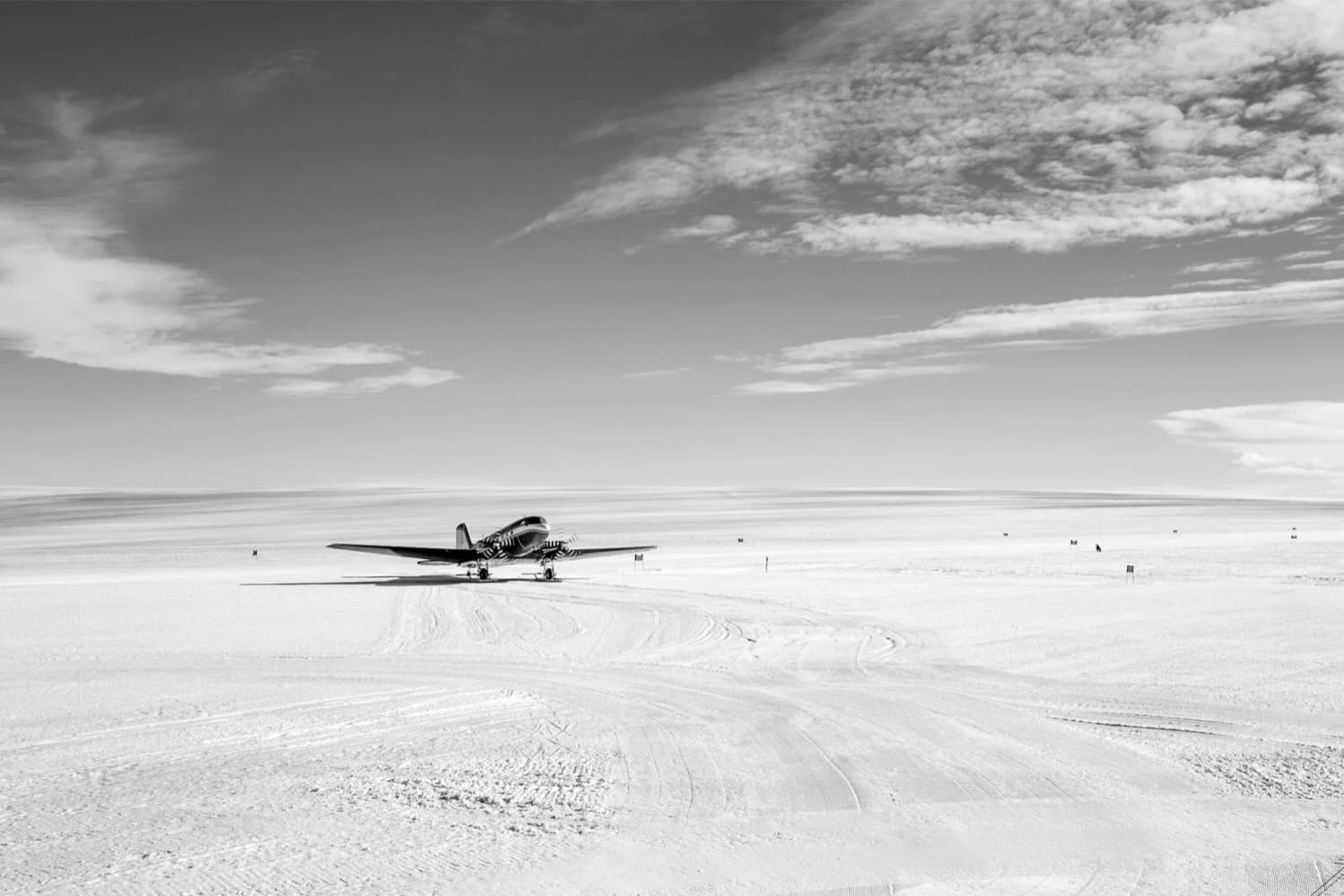 A light aircraft on a beach airstrip