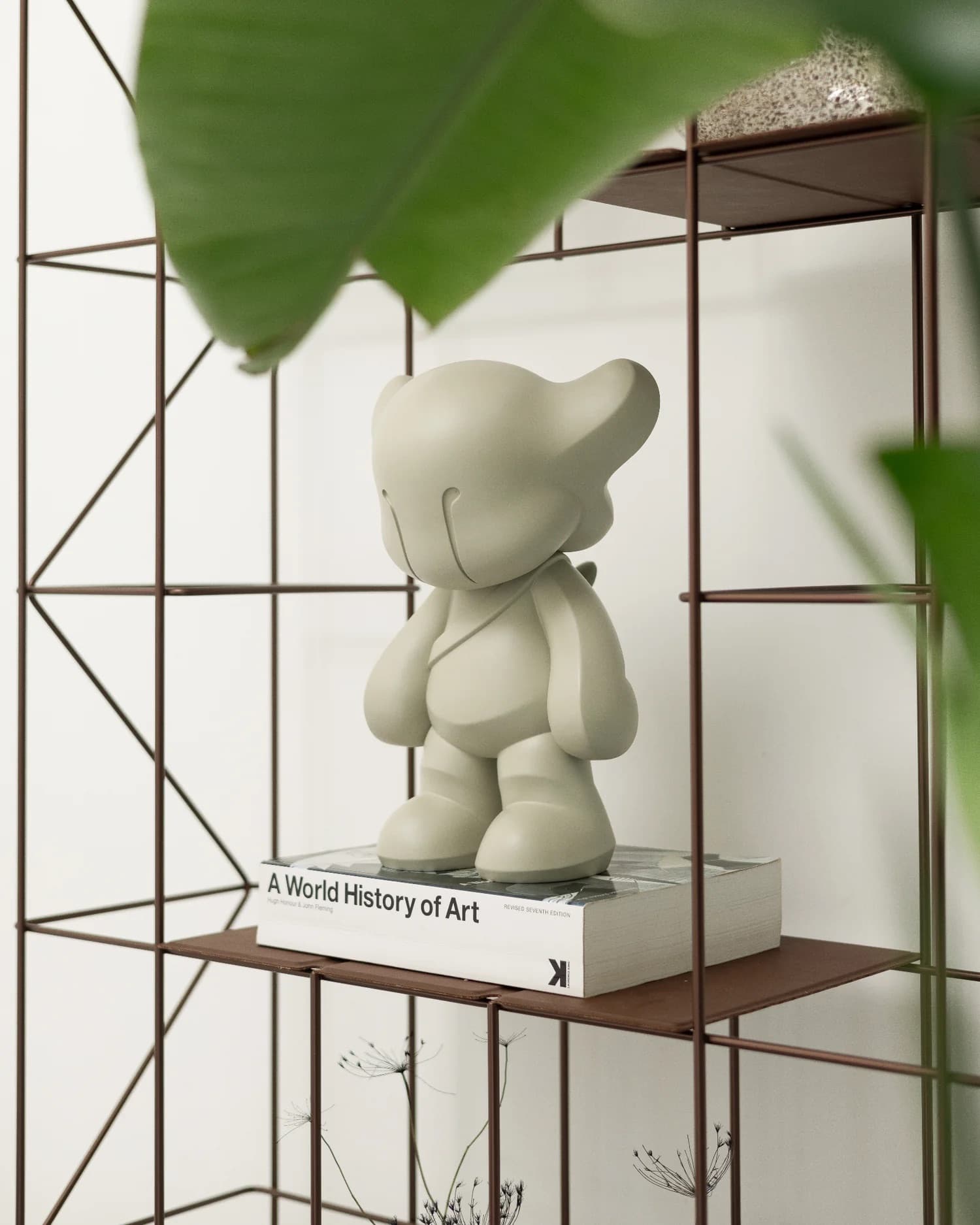 Yuki on a bookshelf